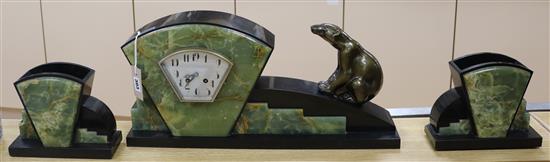 An Art Deco marble clock garniture